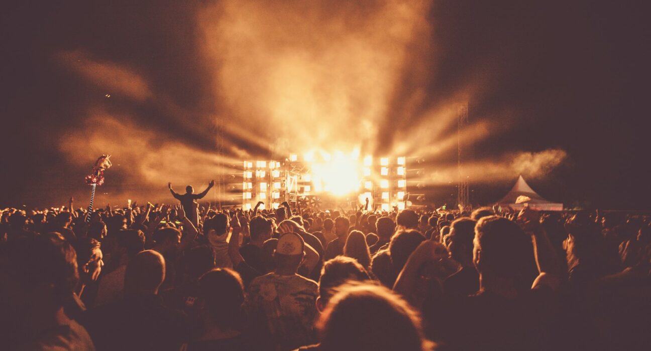 Been So Good lyrics meaning - worship concert crowd with hands raised under stage lights