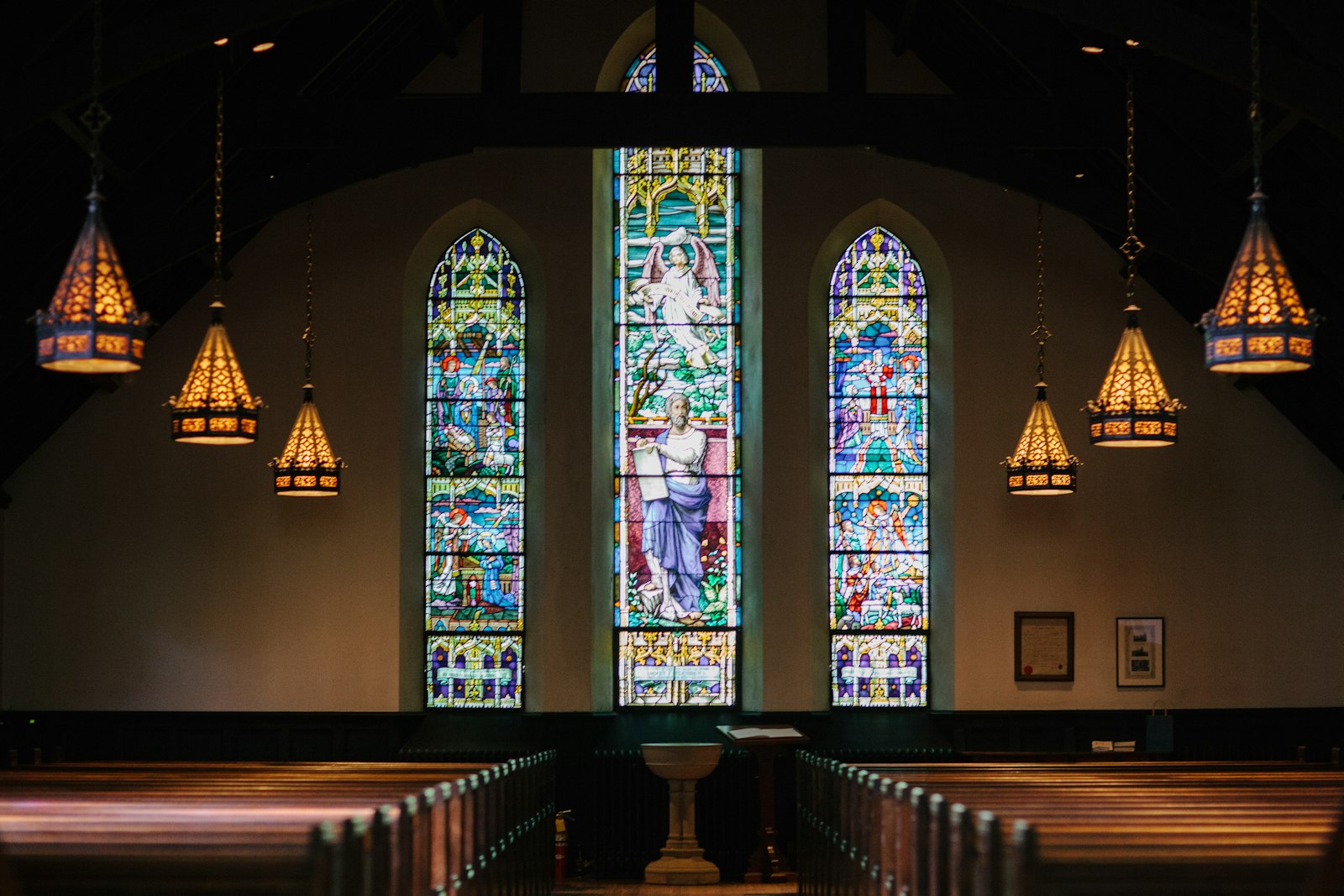 Alpha and Omega lyrics meaning - church interior with light streaming through windows